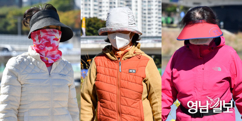 [포토뉴스] 찬바람에 두터워진 옷차림