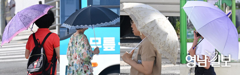 [포토뉴스] 폭염 속 각양각색 양산 들고 나온 대구 시민들