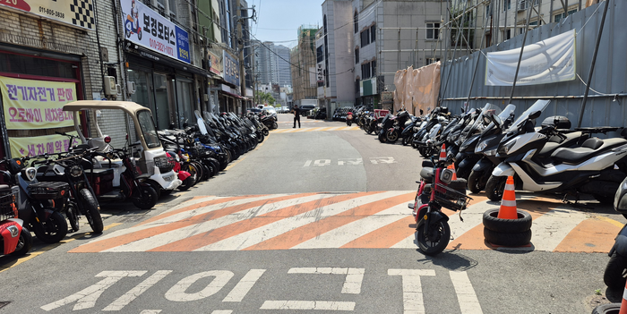 “바꾼다고 사람 오나” 중구 미싱·오토바이골목 간판 개선, 현장선 회의적 목소리