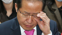 홍준표 시장 '雨中골프' 논란에 