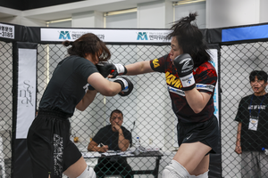 KMMA 오정은 두 체급 챔피언 도전…무승부로 마무리